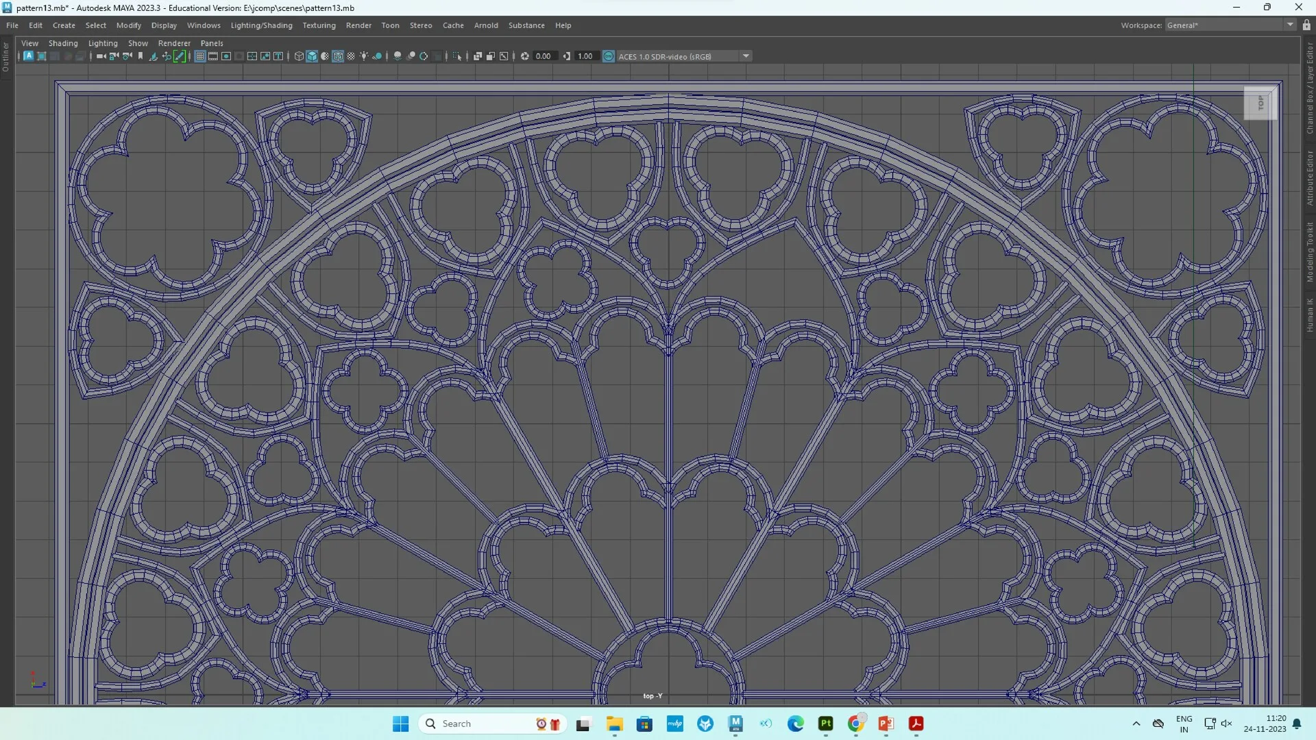 Close-up of complex Gothic rose window geometry and wireframe in the Maya viewport.